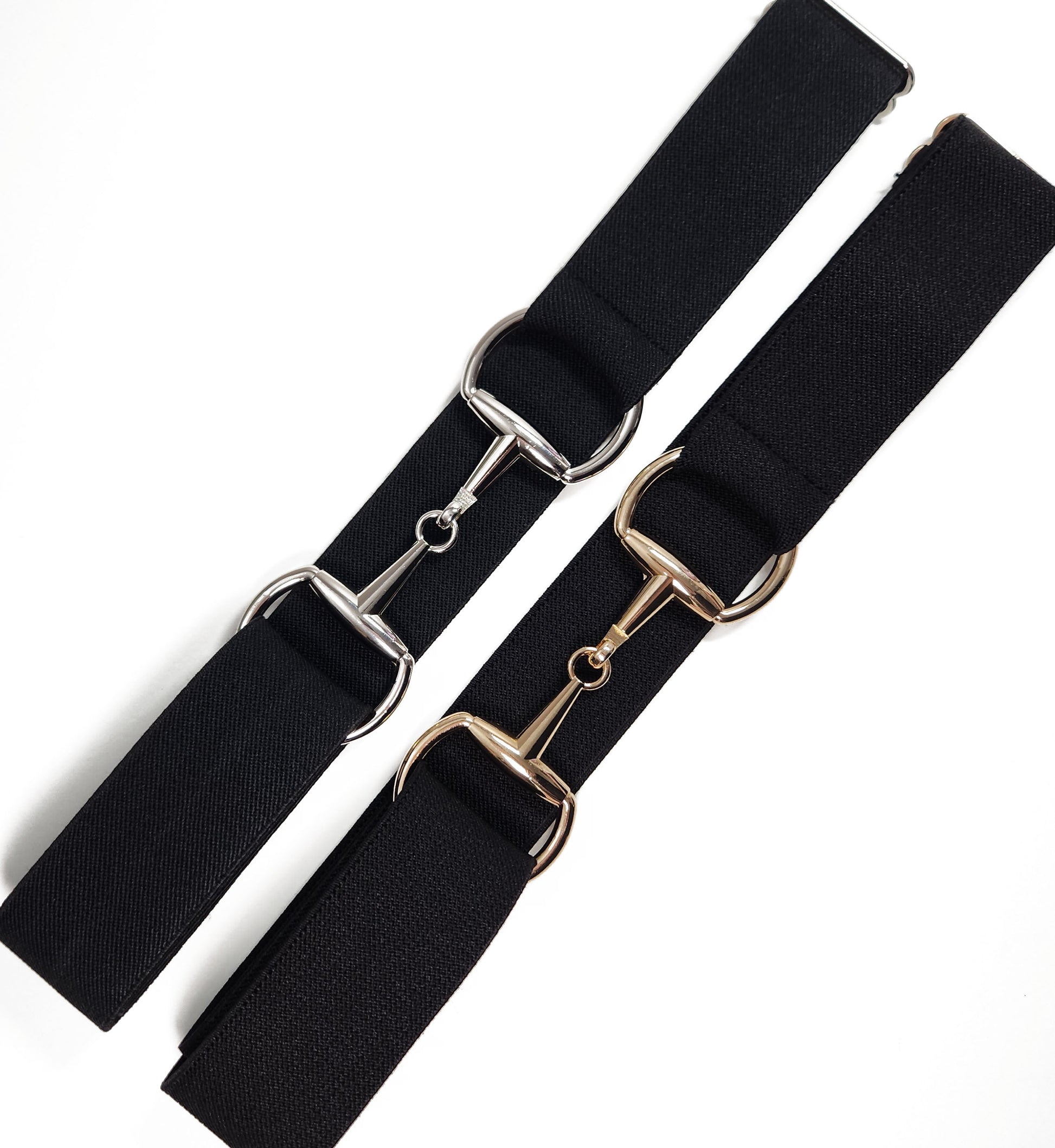 Black stretch bit belt with gold snaffle buckle, versatile for schooling or show ring wear.
